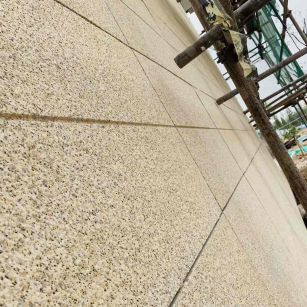 泰州 黄金麻花岗岩荔枝面外墙干挂石材效果示例