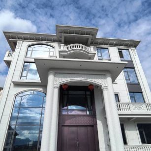 泰州白麻别墅外墙干挂石材效果示例