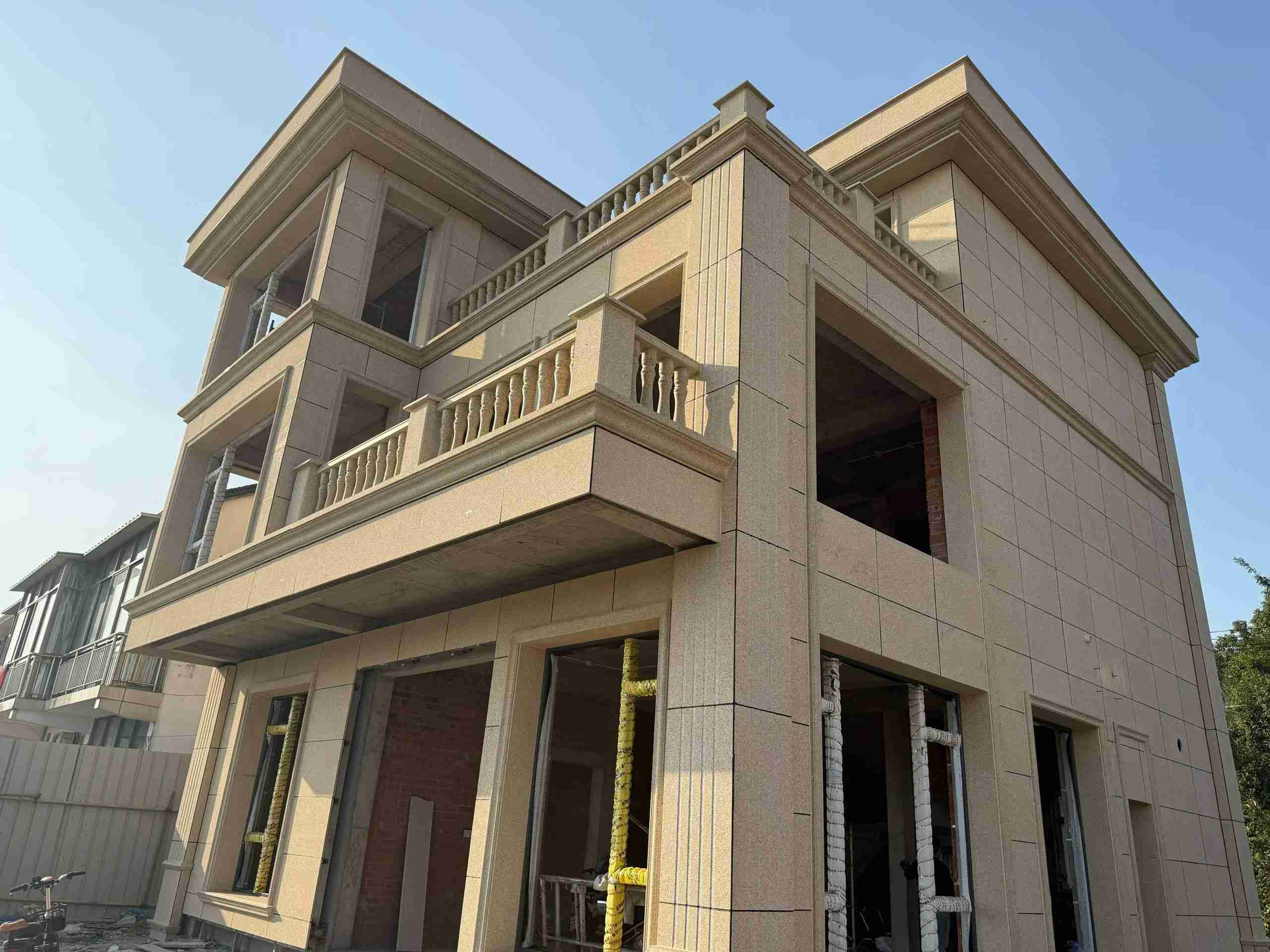 泰州 黄金麻花岗岩石材荔枝面外墙干挂效果展示